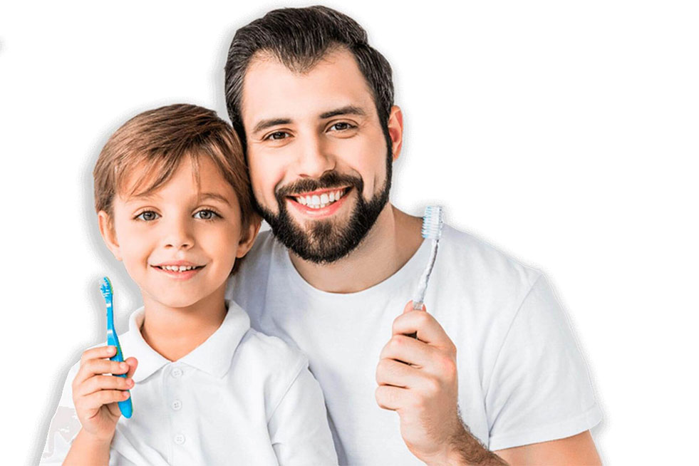 father and son holding toothbrush
