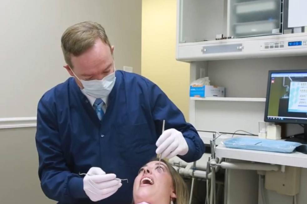 dentist performing a treatment