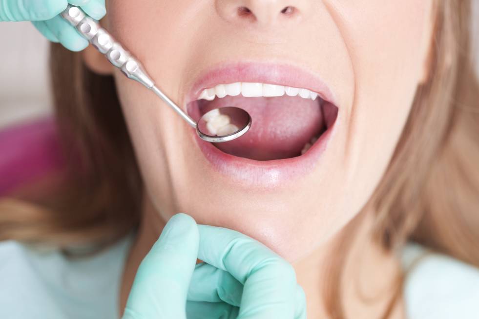 teeth being examined